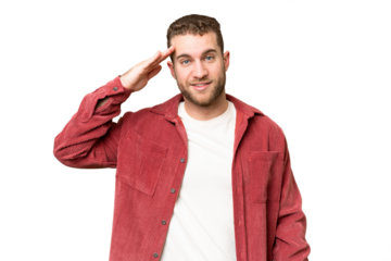 Young handsome blonde man over isolated chroma key background saluting with hand with happy expression