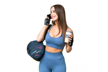 Young sport woman with sport bag over isolated chroma key background holding coffee to take away and a mobile