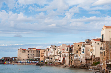 The fishing village of Cefalu in Sicily / The fishing village of Cefalu with its town beach on Sicily, Italy. - 568698789