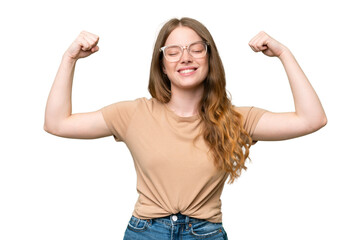 Young pretty woman over isolated background doing strong gesture