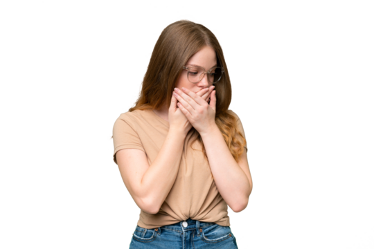 Young pretty woman over isolated background covering mouth and looking to the side