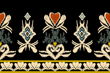 Ikat floral paisley embroidery on black background.geometric ethnic oriental pattern traditional.Aztec style abstract vector illustration.design for 