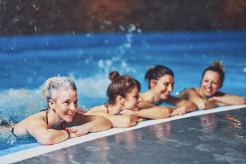 Group of woman in pool having training