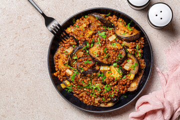 Lentil and eggplant curry. Mediterranean vegan dish. Top view.