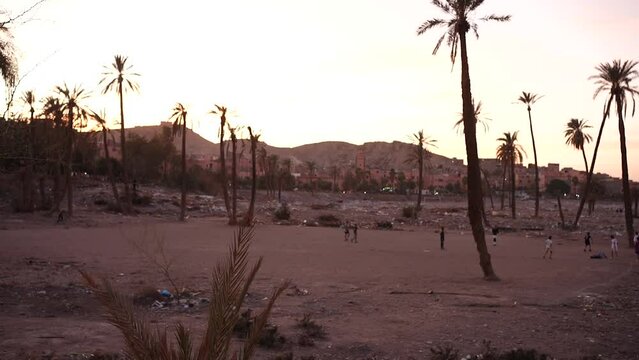 Poor children of Africa playing rural football
