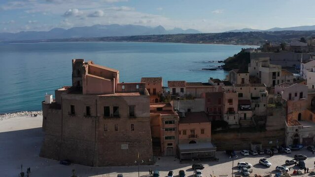 Aerial Dolly Towards Castello Arabo Normanno With Gulf Of Castellammare In Background