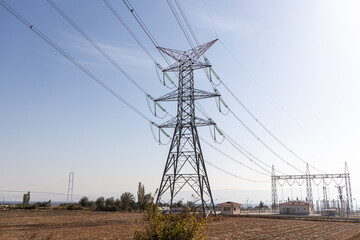 Gray power line is on the blue sky background