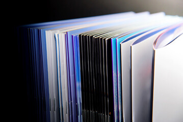 stack of books on black background