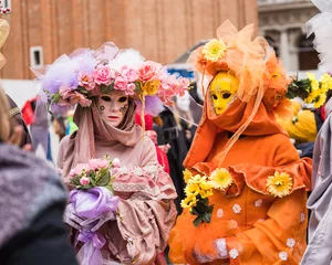 Poster People wearing colorful masks and costumes during the Venice Carnival © gammaphotostudio