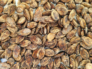Background of spotted brown and white watermelon seeds