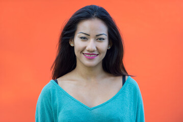 Fototapeta premium Young asian female teen portrait on colored background