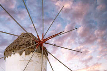 Traditional greek windmill on Mykonos island, Cyclades, Greece sunset view