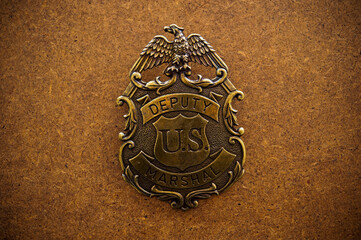 brass US Marshall badge
