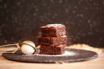Chocolate brownies cake and sugar filter for powder