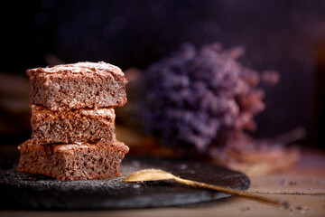 Dark chocolate brownies stack, lavender flowers