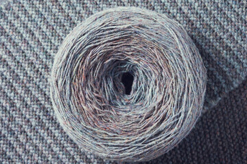 Round skein of wool yarn. Hobby, knitting, needlework.