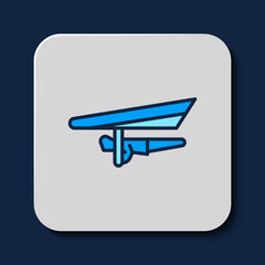 Filled outline Hang glider icon isolated on blue background. Extreme sport. Vector