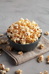 Homemade Kettle Corn Popcorn with Salt in a Bowl, side view.