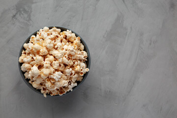 Homemade Kettle Corn Popcorn with Salt in a Bowl, top view. Flat lay, overhead, from above. Copy...