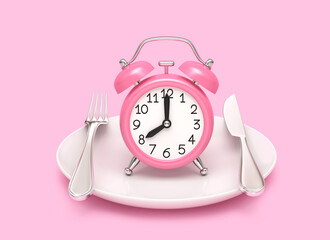 Alarm clock and plate with fork and knife on pink background