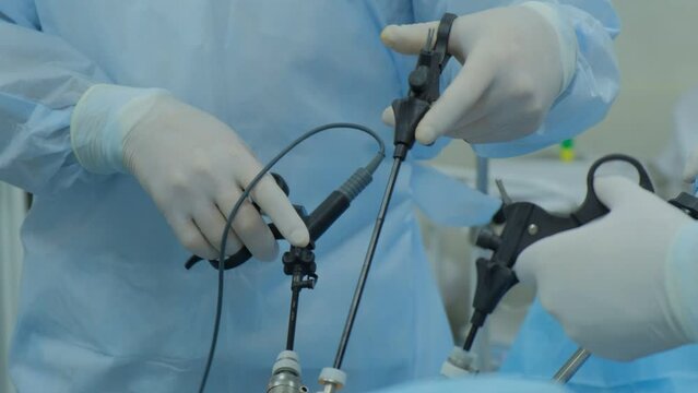 Laparoscopic cholecystectomy instrument. The surgeon's doing laparoscopic gastric sleeve surgery in the operating room.