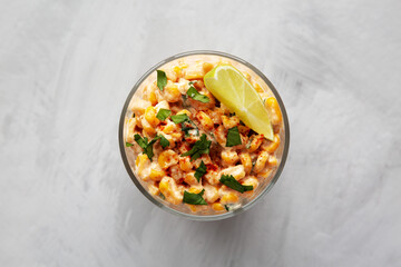 Homemade Mexican Corn Elote Esquites, top view. Flat lay, overhead, from above.