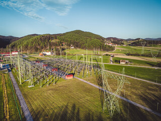 Aerial view of electrical power station in the country side of Slovenia on a sunny day