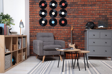 Living room decorated with vinyl records. Interior design