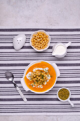Creamy vegetable soup with chickpeas and spices