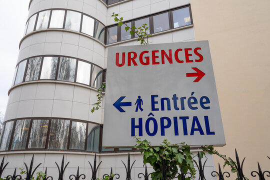 Enseigne avec "URGENCES" &eacute;crit en rouge et "Entr&eacute;e H&ocirc;pital" en bleu indiquant respectivement la direction du service des urgences et l'entr&eacute;e d'un h&ocirc;pital en France