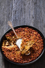 Tasty Bake with meat, mushrooms, cheese, onion