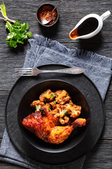 baked chicken leg with spicy roast cauliflower