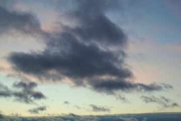 Fototapeta premium Colourful cloudy twilight beautiful sky cityscape sunset and morning sunrise. Dramatic evening night early morning view. Panoramic nature background concept. Copy space for text. World environment day
