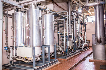 Industrial interior chiller and boiler HVAC heating ventilation air conditioning system and pipping line of industrial construction at boiler pump room system in the factory. factory compressor