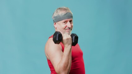 Bizarre Senior Gym Session with Dumbbells and Blue Background