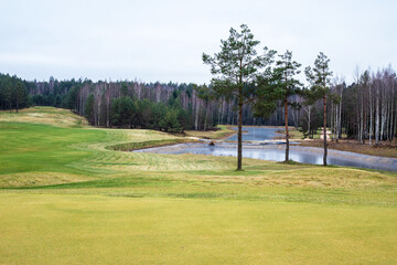 Obraz premium Aerial view of nice autumn golf course