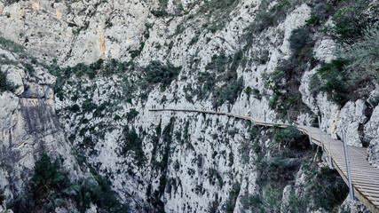 Caminito or walkway of Relleu. The Relleu Dam footbridge allows you to enjoy a through a narrow and spectacular gorge known as L'Estret del Pantà (the strait of the swamp).In Relleu, Alicante, Spain