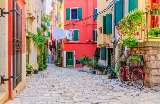 Fototapeta Rovinj, Croatia. Stone paved street inside the old town. Istria.