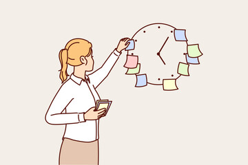 Business woman using stickers on clock to meet deadlines set by manager and launch project on time