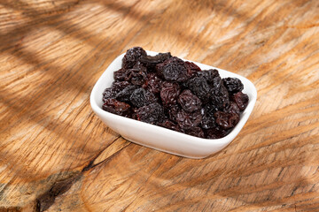 Healthy Food - Nuts Dehydrated Grapes; Photo On Wooden Background