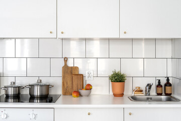 Fototapeta na wymiar cozy kitchen with light interior and household appliance