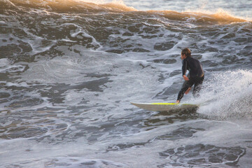 Surfing giant winter waves in Santa Barbara California