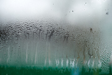 Photo of foggy window glass in winter