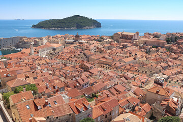 View of the roofs of Dubrovnik and the island of Lokrum - 568776133