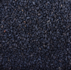 Black Sesame Seeds on a background.
