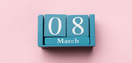 March 8th. Calendar International Womens Day. Wooden block calendar. 8 March and Women's Day concept