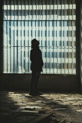 A guy in urbex exploration, Santa Chiara Village, Sardinia