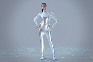 A woman wearing silver dress standing on a grey backdrop, next to virtual icons 