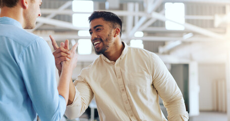 Handshake, greeting and business men at work with a welcome, thank you or communication. Happy, casual and corporate employees with hand gesture for a hello, agreement and coworking in an office