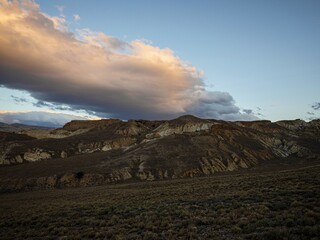 Arid barren badland, wild west desert landscape of Bannockburn Sluicings in former goldmine in...